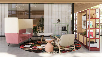 Moderne und nachhaltige Raumgestaltung von Unterrichtsräumen mit einem Runden Teppich und verschiedenen, gemütlichen Sitzmöglichkeiten um einen runden Tisch herum.